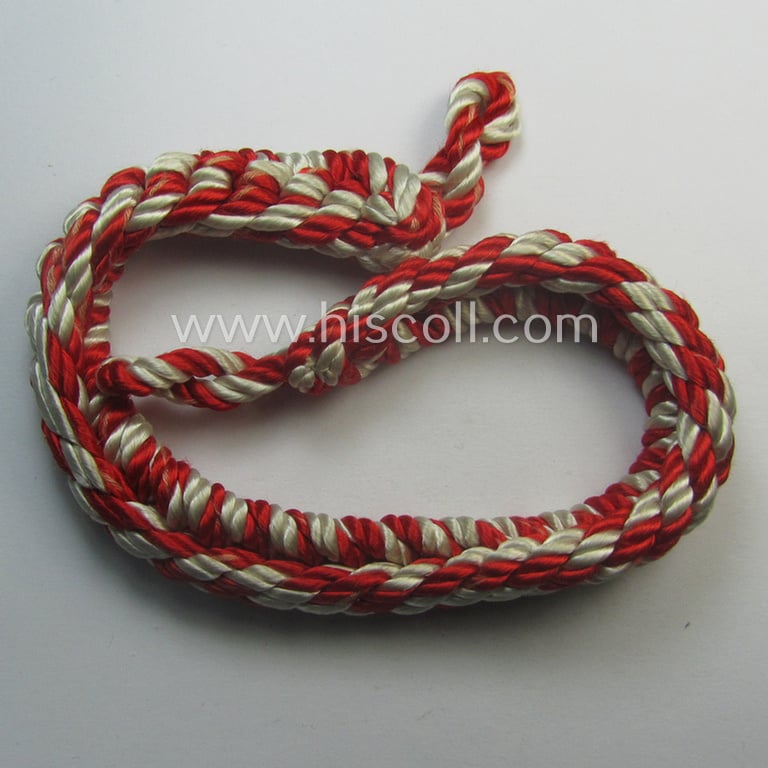 Attractive - and scarcely encountered! - HJ/DJ (ie. 'Hitlerjugend' etc.) so-called: 'leaders-lanyard' (ie. 'Führerschnur') as was intended for usage by a youth-member holding the rank of: 'HJ-Kameradschaftsführer' (ie. 'DJ-Fähnleinführer')