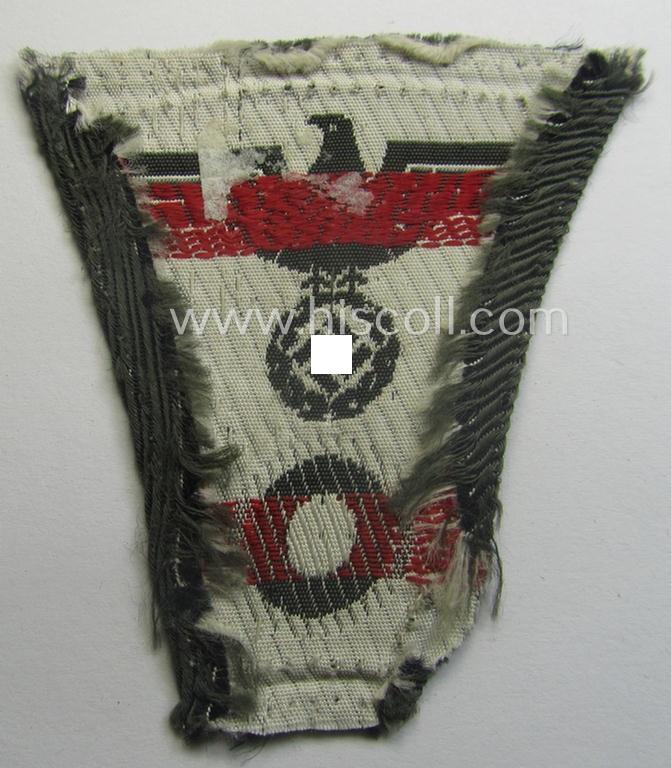 'Foreign-produced' (!) WH (Heeres) related, so-called: 'M43-pattern'-cap-trapezoid (ie. 'Mützentrapez') as executed in machine-woven- (ie. BeVo-like-) pattern onto a typical greenish-/field-grey-coloured- and/or linnen-based background