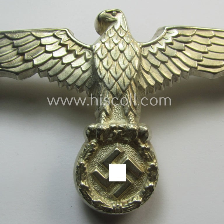Larger-sized, WH (Kriegsmarine): 'DAK' (ie. 'Deutsches Afrikakorps') 'Buntmetall versilbertes' so-called: 'pith-helmet' eagle-device as intended for: 'Beamten der Kriegsmarine'