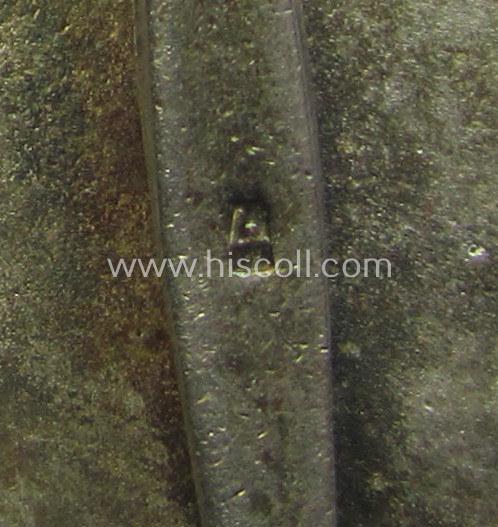 'Kriegsverdienstkreuz 1. Kl. mit Schwn.' being a maker- (ie. '4'-) marked and/or: 'Buntmetall'-based specimen by: 'Steinhauer & Lück'