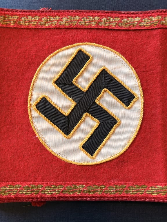 GERMAN WWII AUTHENTIC POLITICAL LEADERS NSDAP THIRD REICH GAU LEVEL ARMBAND WITH RZM PAPER TAG.