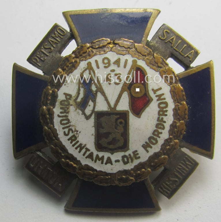 Attractive - and scarcely encountered! - so-called: Finnish-/German: 'Nordfrontkreuz', being a white-/blue-coloured and maker- (ie. 'Barck - Helsinki'-) marked 'variant' that shows the text: 'Pohjoisrintama - Die Nordfront - 1941/43'