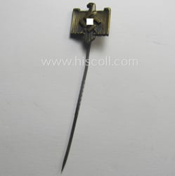 Darker-bronze-toned lapel-pin (ie. 'Mitgliedsabzeichen des DRL bzw. NSRL')...