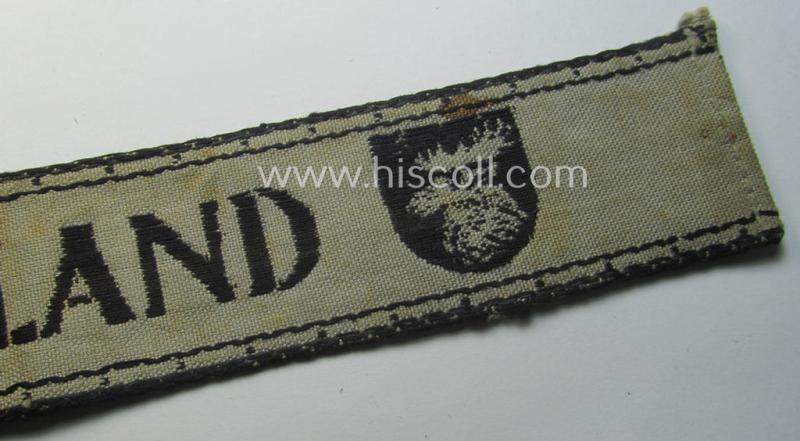 Full-length example of a WH (Heeres ie. Kriegsmarine) cuff-title- ie. armband (ie. 'Ärmelstreifen') entitled: 'Kurland' that comes in an overall very nice- (albeit clearly used- ie. tunic-removed-), condition