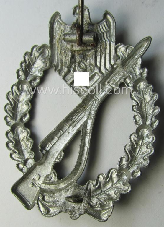 Neat 'Infanterie Sturmabzeichen in Silber', being an unmarked (and/or very converse- ie. vaulted-) 'hollow-back' example by the maker: 'Friedrich Linden' (ie. 'F.L.L.') as was executed in silver-coloured, zinc-based metal (ie. 'Feinzink')