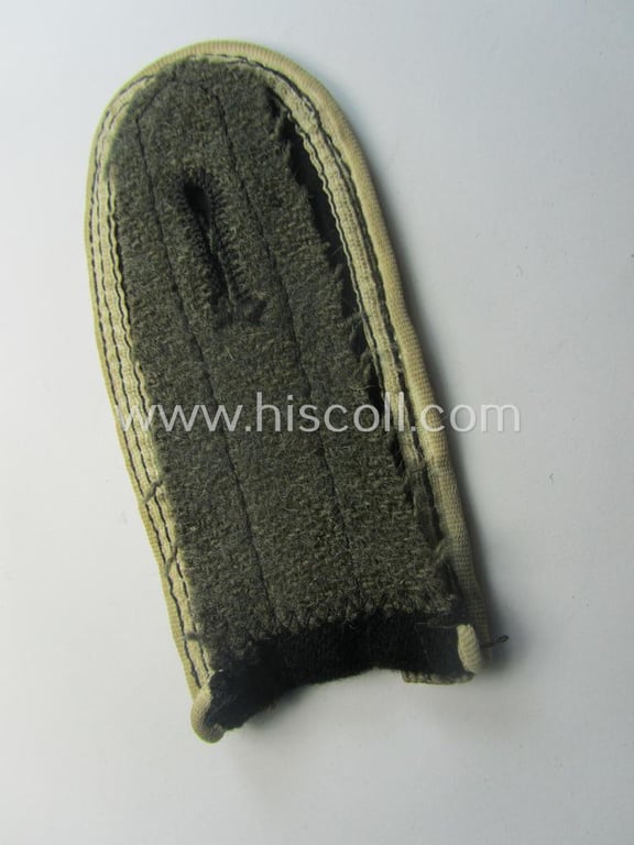 Single - later-war-period- ie. so-called: 'M44'-type and simplified - Waffen-SS, NCO-type shoulderstrap as was intended for usage by an: 'SS-Unterscharführer' who served within the: 'SS-Infanterie-Trpn.'