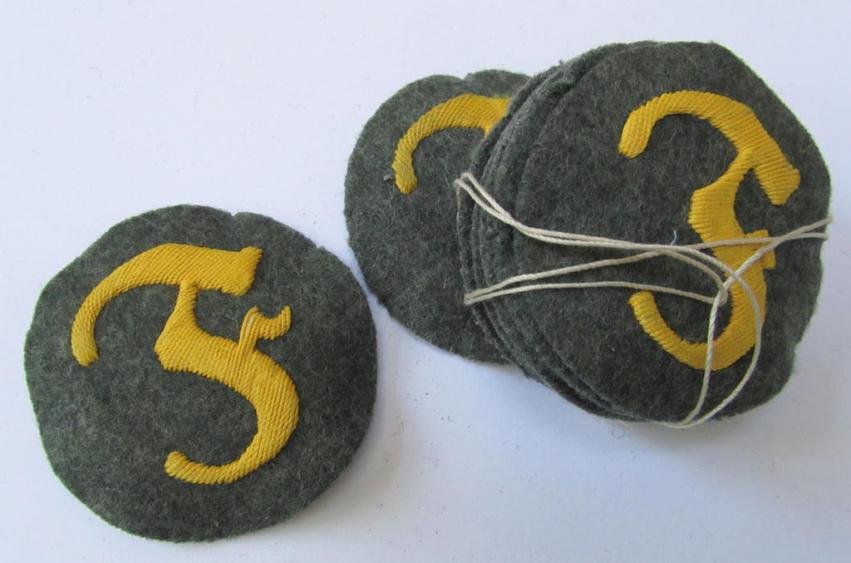 Attractive, WH (Heeres) so-called: trade- and/or special career arm-insignia, as was intended for a: army: 'Feuerwerker', being a neatly hand-embroidered variant on field-grey-coloured wool