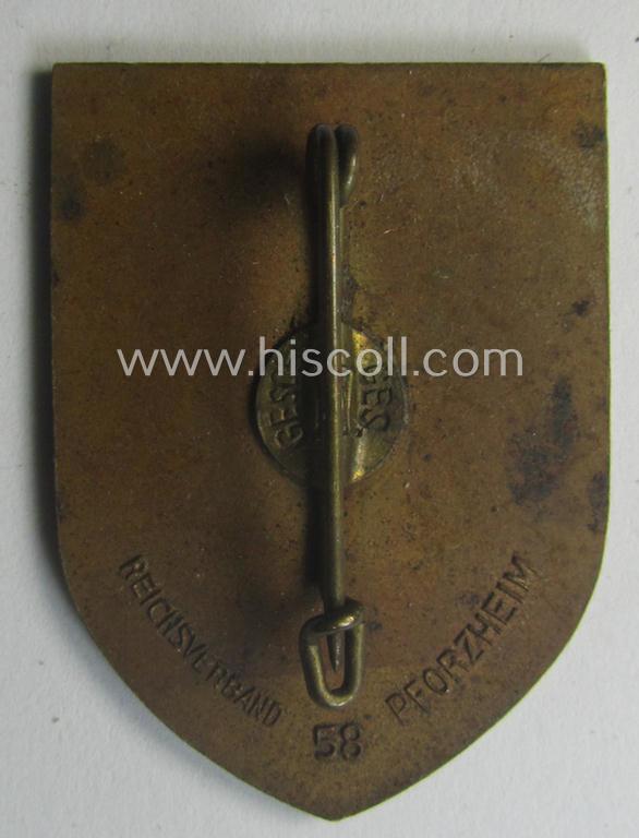 Commemorative, golden-bronze-toned, 'DAF'/'HJ'- (ie. 'Deutsches Arbeits Front o. Hitlerjugend'-) related 'tinnie' being a maker- (ie. 'Reichsverband 58 Pforzheim'-): 'Reichs-Berufs-Wettkampf der deutschen Jugend 1935'