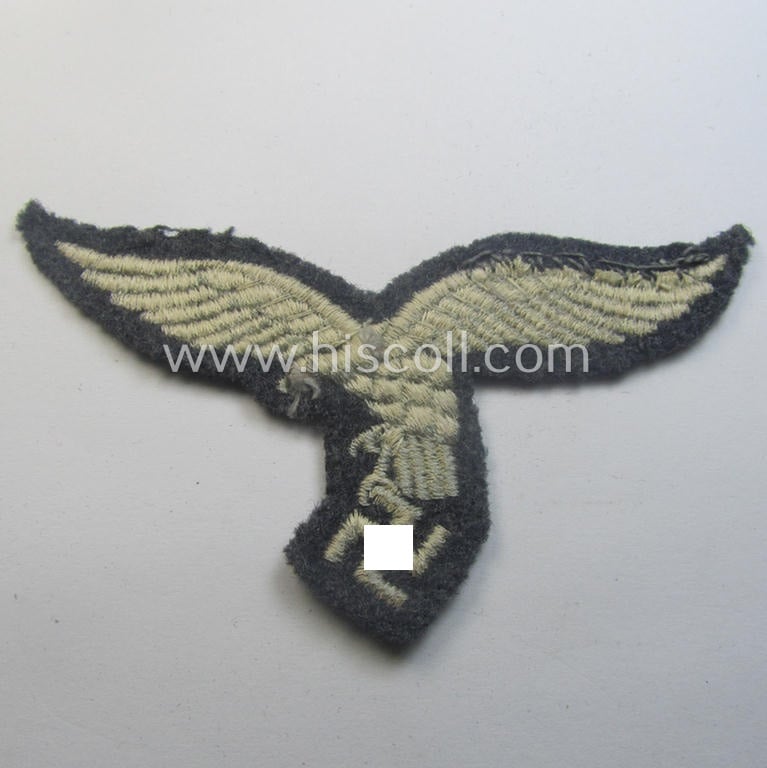 Truly used- ie. worn, WH (Luftwaffe) EM- (ie. NCO-) 'down-tailed'-pattern breast-eagle