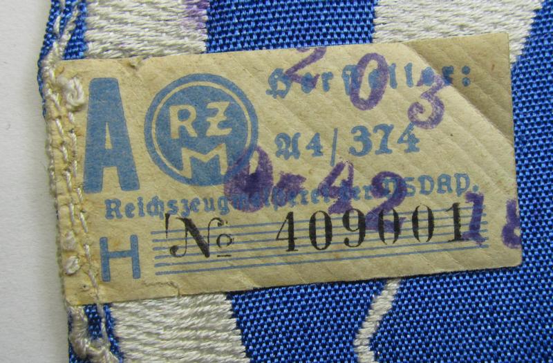 Attractive - and scarcely encountered! - SA (ie. 'Sturmabteilungen'), 'BeVo'-woven sport-shirt insignia still showing its period-attached 'RzM'-etiket as was intended for an SA-member who served within the: 'Gruppe Wartheland' (WA)