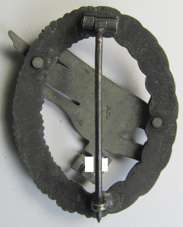 Attractive - and later-war-period! - zinc- (ie. 'Feinzink'-) based version of a WH (Luftwaffe) 'Fallschirmschützen-Abzeichen' being a clearly maker- (ie. 'A'-) marked example as was produced by the: 'Assmann'-company