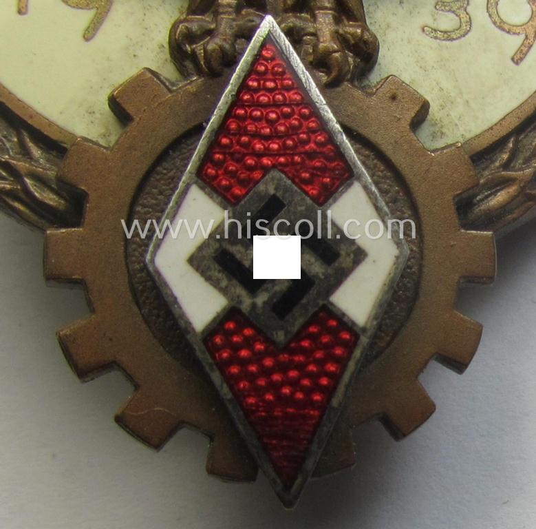 'HJ'- ('Hitlerjugend') ie. 'BDM'-related: 'Reichsberufswettkampf-Siegerabzeichen' (of the 2nd model) entitled: 'Kreissieger 1939' and being a maker- (ie.: 'Ferd. Wagner'-) marked example that comes with its period 'etui-inlay'