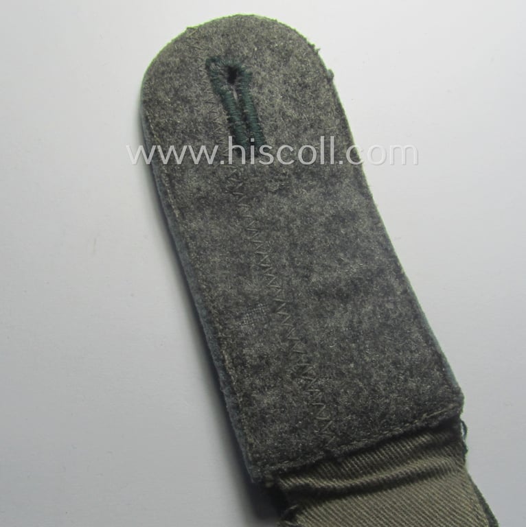 Single, WH (Heeres) EM-type (ie. 'M40'-pattern) shoulderstrap: 'Soldat eines Nachschub-Abtlgs.'