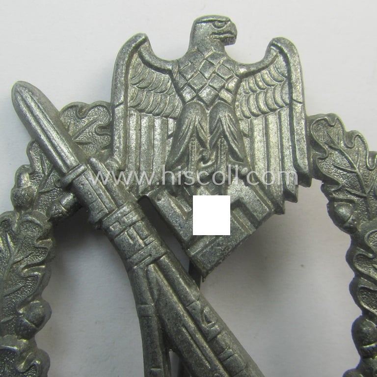 'Infanterie Sturmabzeichen in Silber' being a non-maker-marked and/or typical zinc- (ie. 'Feinzink'-) based version as was (I deem) procuded by the: 'Frank & Reif'-company