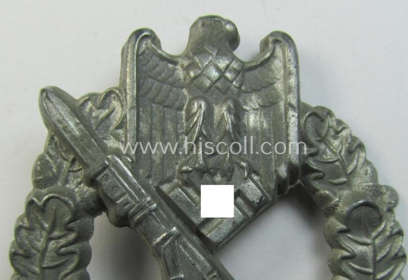 Attractive, 'Infanterie Sturmabzeichen in Silber', being an unmarked (and minimally converse- ie. vaulted-) 'hollow-back' example as was executed in silver-coloured, zinc-based metal (ie. 'Feinzink') as produced by the maker: 'Schauerte & Höhf...