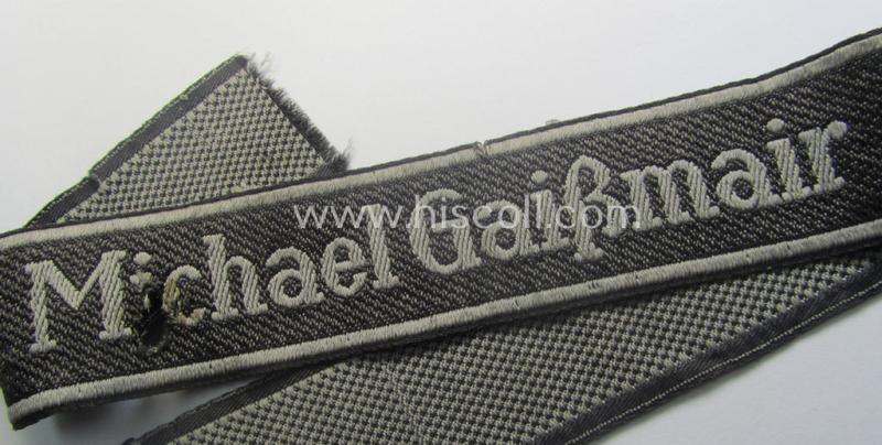Truly used and/or worn - albeit regrettably somewhat damaged! - Waffen-SS cuff-title (ie. 'Ärmelstreifen') as executed in neat 'BeVo'-weave pattern as intended for a member serving within the: 'SS-Geb.Jäger-Regiment 12' - "Michael Gaißmair"