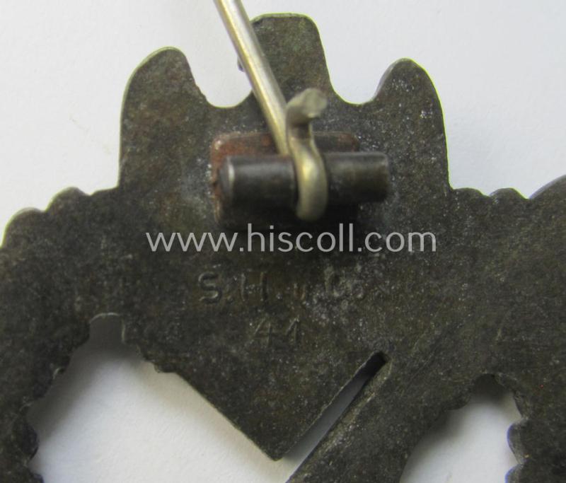 Attractive - and detailed! - 'Infanterie Sturmabzeichen in Bronze' (or: bronze-class infantry assault-badge ie. IAB) being a maker- (ie. 'S.H.u.C.o. 41'-) marked example as executed in bronze-toned, zinc-based metal (ie. 'Feinzink')