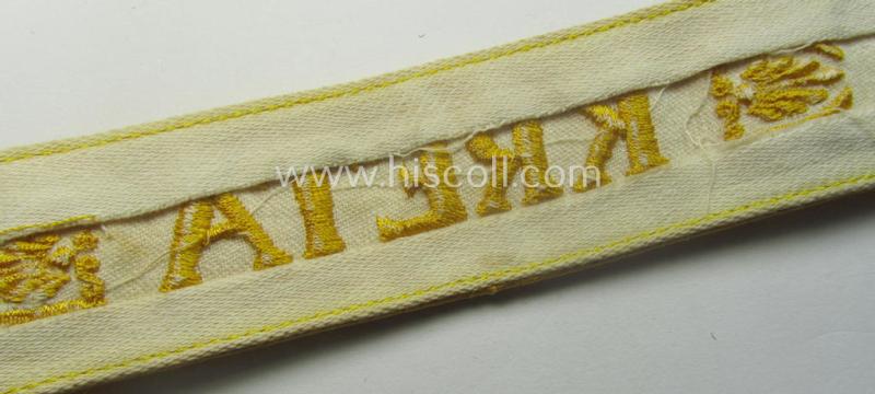WH (Luftwaffe o. Heeres) cuff-title (ie. 'Ärmelstreifen') entitled: 'Kreta' that comes in a presumably issued- (albeit I deem never used- ie. 'virtually mint'-), condition