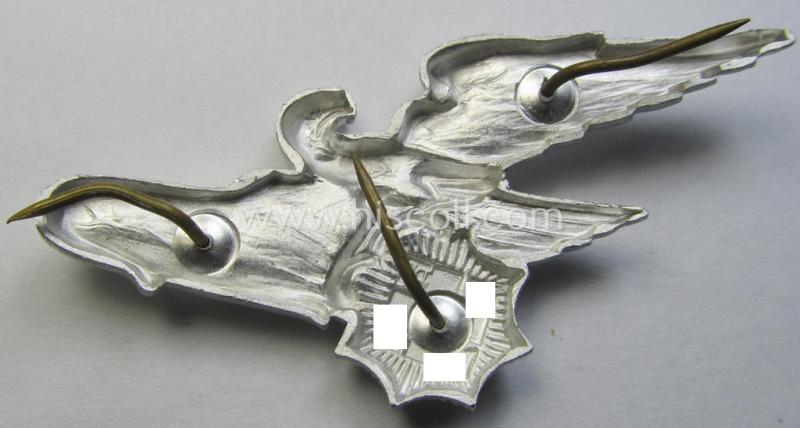Attractive - and scarcely encountered! - officers'- (ie. evt. NCO-) pattern, aluminium-based so-called: 'Luftschutz' (ie. RLB-) visor-cap eagle being a maker- (ie. 'HA'-) marked example as was produced by the 'H. Aurich'-company