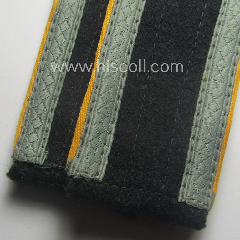 Pair of fully matching, 'M44'- ie. 'simplified'-pattern, Waffen-SS NCO-type shoulderstraps as piped in the golden-yellow-coloured branchcolour for usage by an 'Unterscharführer' who served within the: 'Waffen-SS Kavallerie o. Aufklärungs-Trpn.'