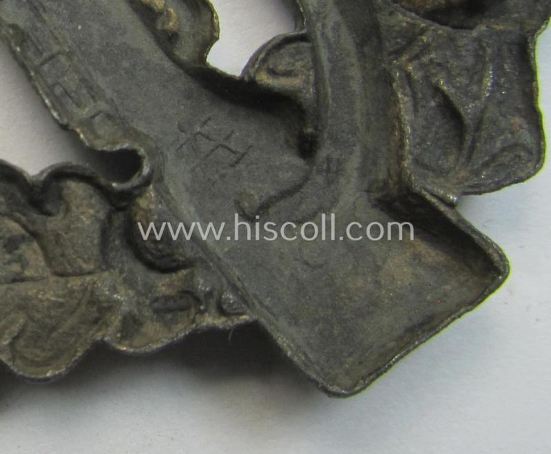 Superb - and/or truly detailed! - 'hollow-back'-pattern 'Infanterie-Sturmabzeichen in Bronze' being a clearly maker- (ie. 'A'-) marked example by the: 'Assmann'-company as executed in bronze-toned- and zinc-based metal (ie. 'Feinzink')