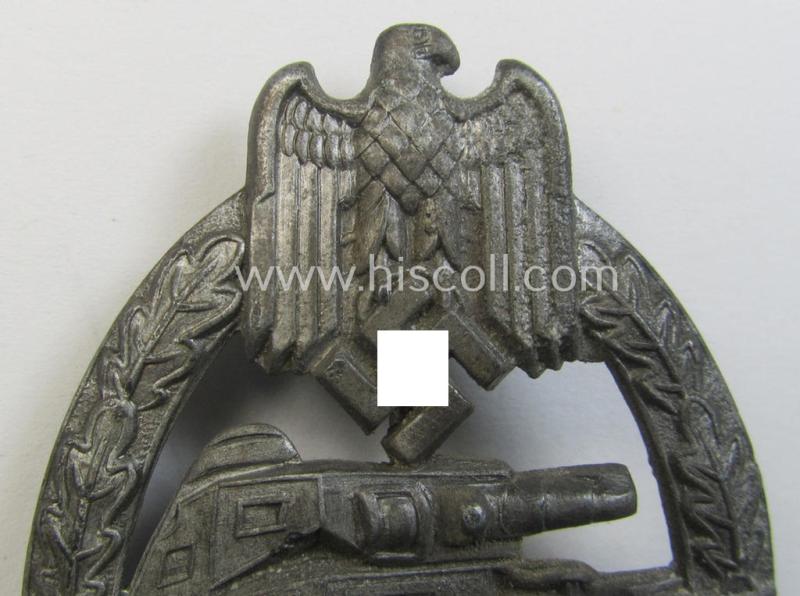 'Panzerkampfabzeichen in Silber' (or: silver-class panzer-assault badge or PAB) being a non-maker-marked- and/or hollow zinc- (ie. 'Feinzink'-) based example as was produced by the: 'Paul Meybauer'-company