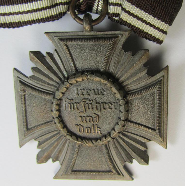 Superb, 'N.S.D.A.P. Dienstauszeichnung in Bronze' (ie. being of the '3. Stufe für 10 Jahre treue Dienste') being a non-maker-marked- (and 'heavy-weight'!) example that comes mounted onto its female-related ribbon (ie. 'Bandabschnitt')