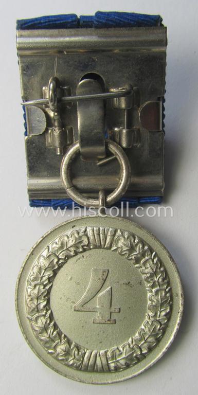 Attractive, silver-toned & detachable WH (Heeres o. KM) so-called: 'Einzelspange' showing a: 'WH-Dienstauszeichnung 4. Stufe' (as was intended for 4 years of loyal-service) and that shows a detailed, Heeres o. KM-type-eagle-device, period-attache...