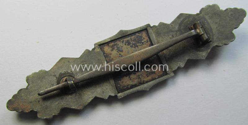 'Nahkampfspange in Bronze' (or: bronze-class close-combat clasp ie. CCC) being a maker- (ie. 'F.&B.-L.'-) marked- and/or minimally converse-shaped specimen as was produced by the maker- (ie. 'Hersteller') 'Funcke u. Brüninghaus'