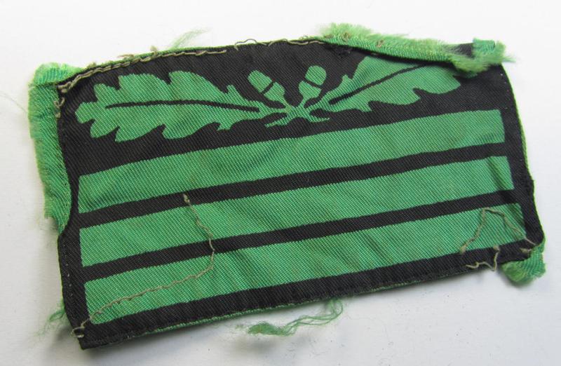 Truly worn - albeit regrettably single - officers'-pattern, WH (Heeres o. Waffen-SS) rank-insignia-bar (for usage on the various camouflaged-uniforms) as was used by an officer holding the rank of: 'Hauptmann' (ie.: 'Waffen-SS Obersturmführer')