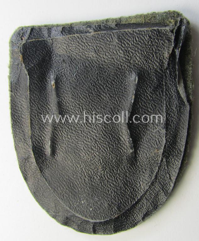Stunning - and actually scarcely encountered! - WH (Heeres ie. Waffen-SS) 'Kuban'-campaign-shield that comes mounted onto its original field-grey-coloured- and/or woolen-based 'backing'