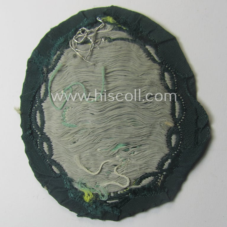 Truly used and/or tunic-removed, WH (Heeres) EM- (ie. NCO-) type, so-called: 'Edelweiss'-armpatch being a 'BeVo'-woven example as was executed on darker-green linnen as was specifically intended for usage by the: 'Gebirgsjäger-Trp.'