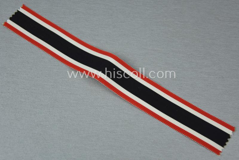 Neat spare-part: a non-confectioned- (ie. full length- ie. 24 cms. sized-) ribbon (ie. 'Bandabschitt') as was intended for the: 'Kriegsverdienstkreuz II. Kl.' and that comes in an overall very nice- (ie. 'virtually mint ie. unissued'-), conditi...