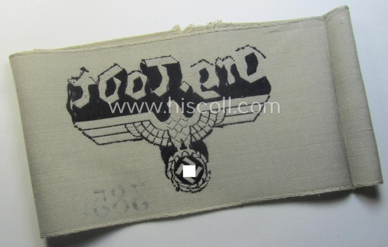 Superb - and rarely seen! - OT- (ie.: 'Organisation Todt'-) related, greyish-coloured and 'BeVo'-woven armband (ie. 'Ärmbinde') showing a detailed eagle-device and depicting the text: 'Org.Todt.' (and printed serial-number: '3859')