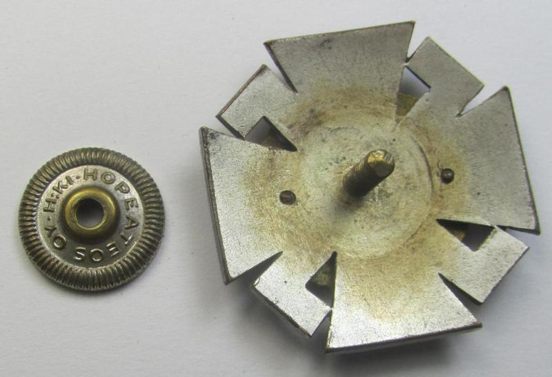 Finnish-/German: 'Nordfrontkreuz', being a white-/blue-coloured and maker- (ie. 'Hopeatakomo o.y.'-) marked 'variant' that shows the text: 'Pohjoisrintama - Die Nordfront - 1941/43'