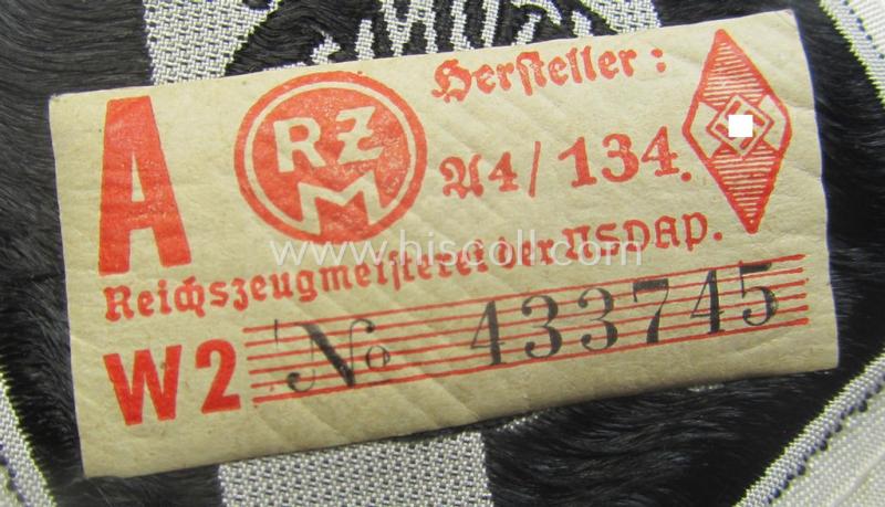 DJ- (ie. 'Deutsches Jungvolk'-) 'Leistungsabzeichen in Eisen in Stoff' that retains its period-attached 'RzM'-etiket