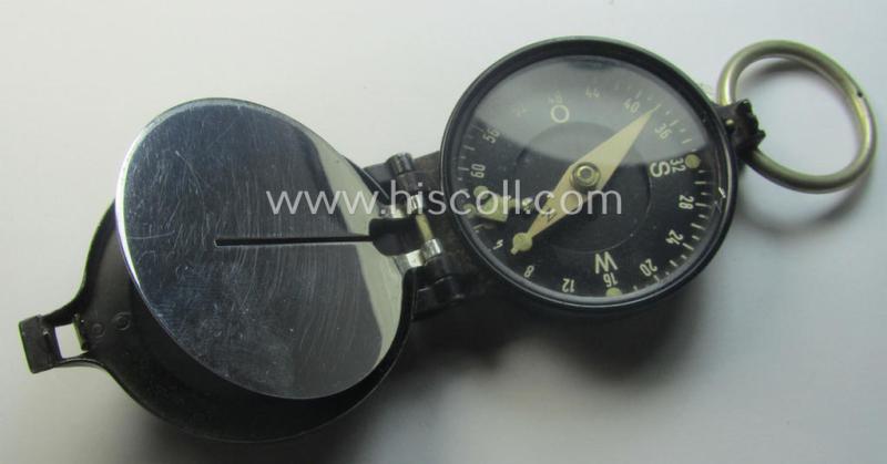 Pre-war-period, 'standard-issue'-pattern and/or (typical) black-coloured (and/or aluminium-based) WH compass (ie. 'Marschkompass') which is nicely maker- (ie. 'Busch - D.R.G.M.'-) marked and/or individually numbered: '106302'