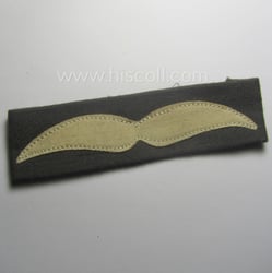 Single, WH (Luftwaffe) greyish-blue-coloured, NCO-type rank-patch (aka 'moustache'),...