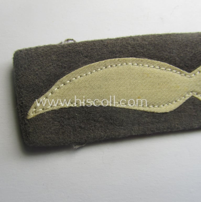 Single, WH (Luftwaffe) greyish-blue-coloured, NCO-type rank-patch (aka 'moustache'), as was intended for usage by a non-commissioned officer with the rank of: 'Unteroffizier'