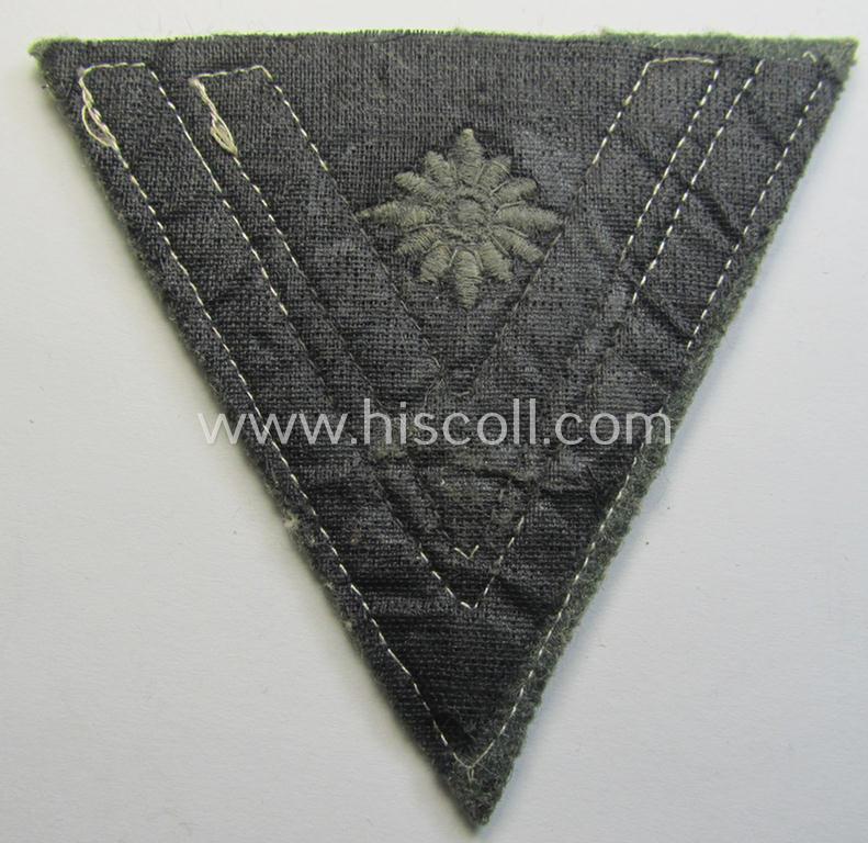 Attractive, WH (Heeres) 'Armwinkel' (or: arm-chevron) as executed on typical field-grey-coloured wool as was specifically intended for usage by a soldier with the (unusually encountered!) rank of: 'Stabsgefreiter'