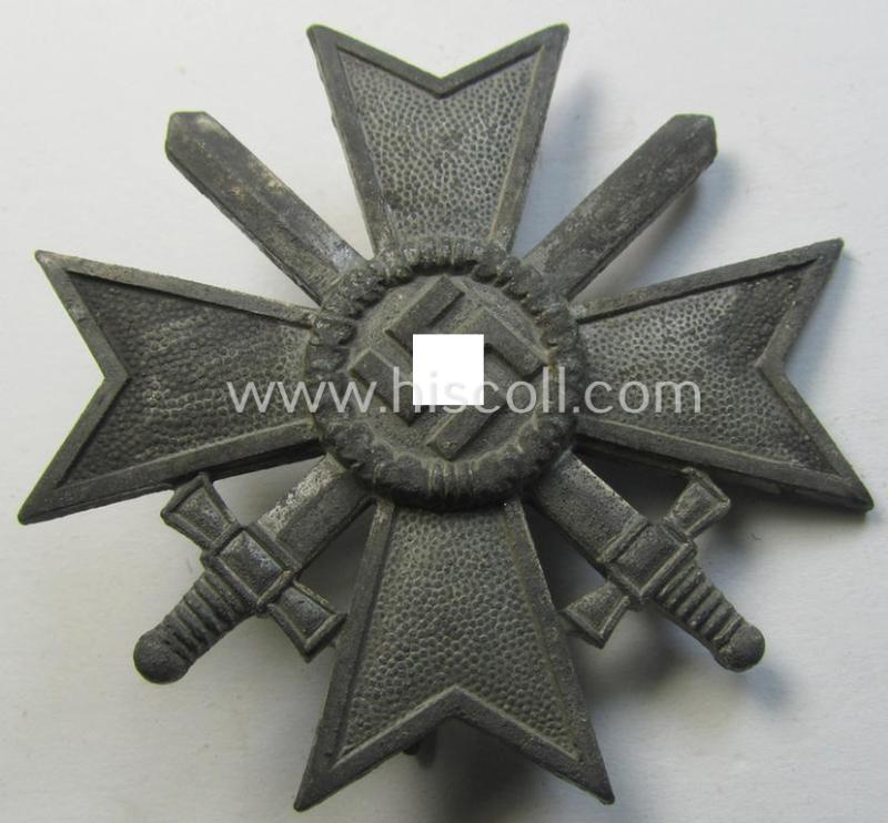 Attractive, 'KvK 1. Klasse mit Schwertern' being a clearly maker- (ie. 'L/13'-) marked specimen that is executed in silverish-grey-coloured and/or zinc-based metal (ie. 'Feinzink') as produced by the 'Hersteller' (ie. maker): 'Paul Meybauer...