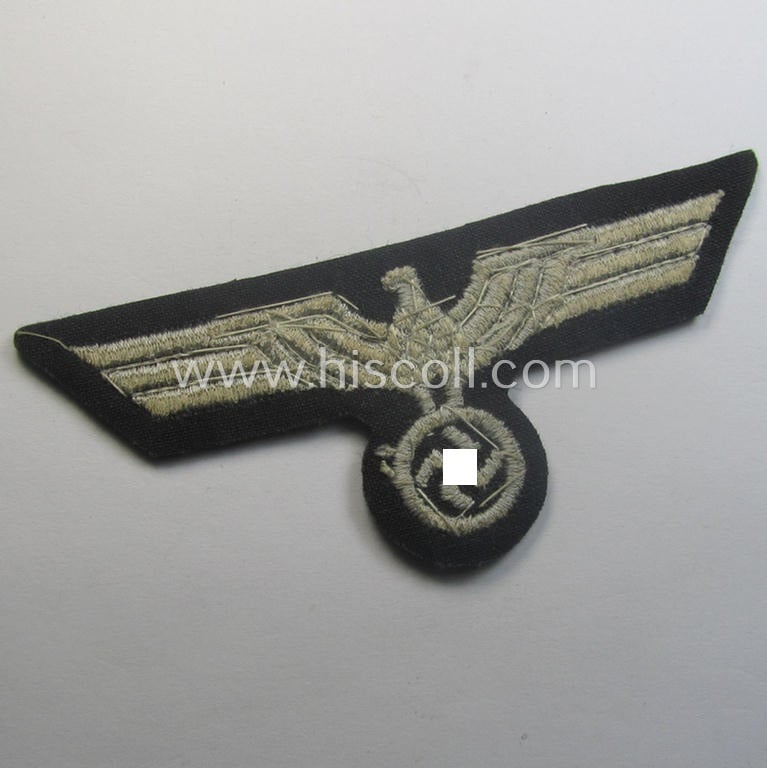 'Variant'-pattern, WH (Heeres) officers'-type, machine-embroidered breast-eagle (ie. 'Brustadler für Offiziere') as was executed in bright-silverish-coloured linnen ie. braid as was intended for usage on the various officers'-pattern tunics
