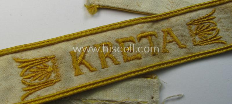Superb, WH cuff-title (ie. 'Ärmelstreifen') entitled: 'Kreta' (being an example that bears a printed 'RbN.'-numeral) and that comes in a surely issued albeit simply never worn nor once tunic-attached, condition