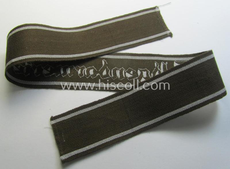 Superb - and scarcely encountered! - example of a WH (Heeres) cuff-title ie. armband (ie. 'Ärmelstreifen') entitled: 'Feldgendarmerie' (being a typical 'semi-BeVo'-woven!) example that comes in a full length- ie. non-shortened, condition