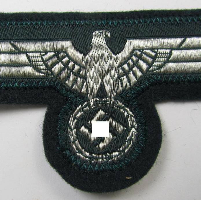 WH (Heeres) breast-eagle as executed in 'BeVo'-type-, so-called: 'flat-wire'-weave-pattern and pre-mounted on darker-green-coloured wool, as was intended for usage by soldiers (ie. NCOs) on their dress-tunics (ie. 'Waffenröcke')