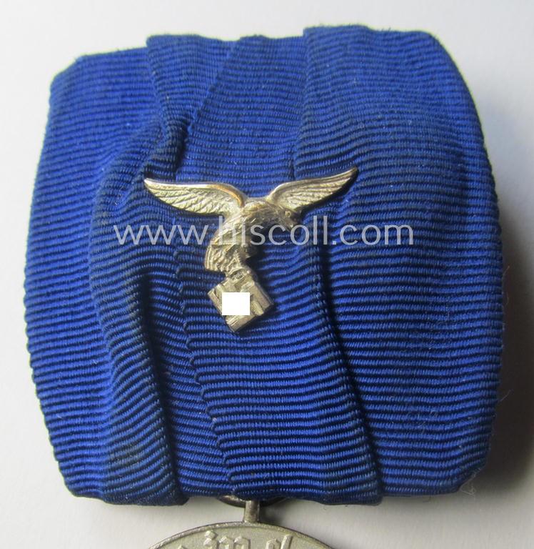 Bright silver-toned - and neatly detachable! - WH (Luftwaffe) so-called: 'Einzelspange' showing a: 'WH-Dienstauszeichnung 4. Stufe' (as was intended for 4 years of loyal-service) and that shows a detailed, LW-type-eagle-device, period-attached