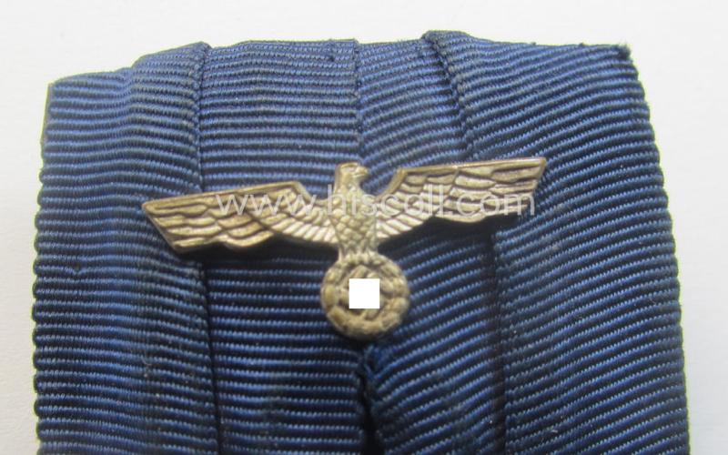 WH (Heeres- o. KM) so-called: 'Einzelspange' showing a: 'WH-Dienstauszeichnung 4. Stufe' (as was intended for 4 years of loyal-service) and that shows a detailed, 'Heeres'-type-eagle-device, period-attached