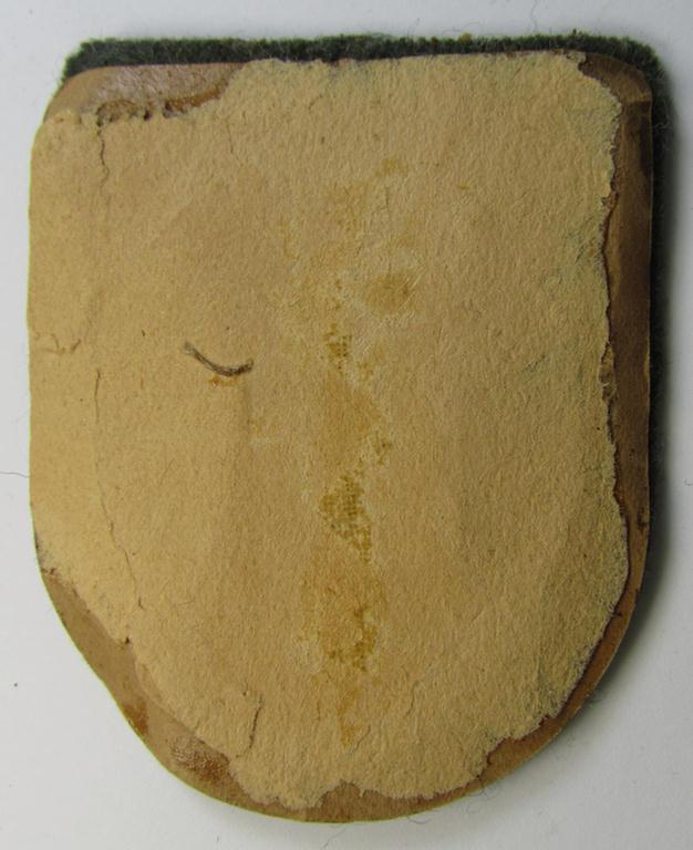 Very attractive - and actually scarcely encountered! - WH (Heeres ie. Waffen-SS) 'Kuban'-campaign-shield that comes mounted onto its original field-grey-coloured- and/or woolen-based 'backing'
