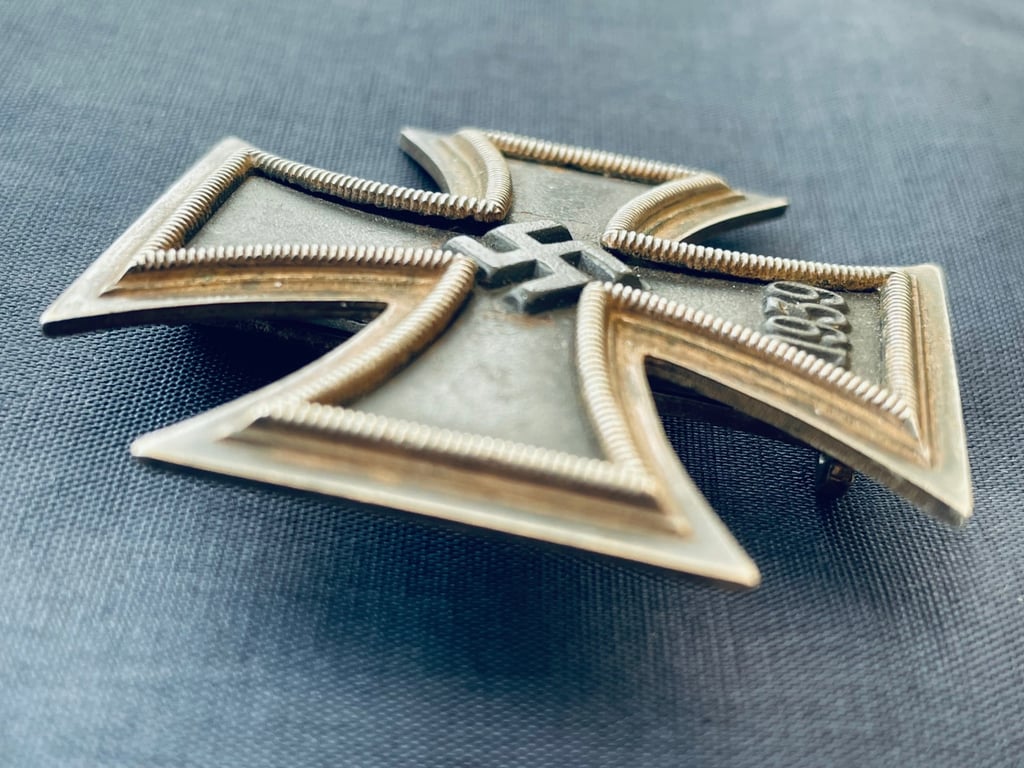 RARE CONCURVED WWII 1ST CLASS IRON CROSS STAMPED NUMBER 4, STEINHAUER & LUCK OF LUDENSCHHELD.
