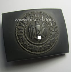 WH (Heeres) bluish-grey-coloured- and/or steel-based belt-buckle being a...